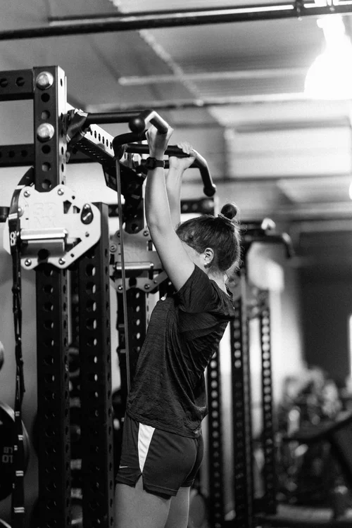 Athlete training overhead strength at Trident Training Club